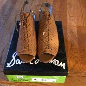 Block heel open back lace up shoe worn once.